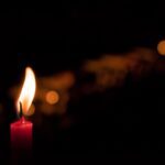 selective focus photography of red candle