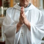 Priest With Rosary Beads