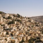 Stunning aerial view of the historic cityscape of Jerusalem, Israel, showcasing its unique architecture and landscape.