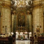 five priest inside cathedral