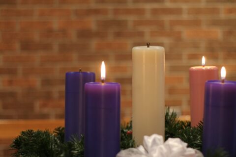 a group of candles sitting on top of a table