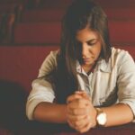 praying woman inside church