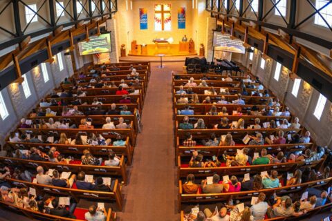 Congregation seated in a church during a service