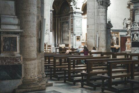 brown wooden chairs and tables inside building