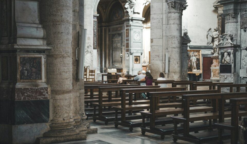 brown wooden chairs and tables inside building