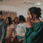 a person with the hands up