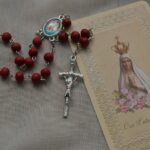 a necklace with a picture of a person on it