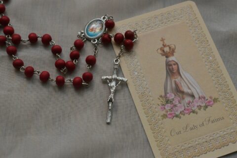 a necklace with a picture of a person on it