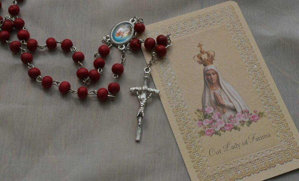 a necklace with a picture of a person on it