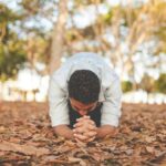 man kneeling