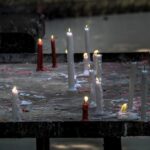 a bunch of candles that are on a table