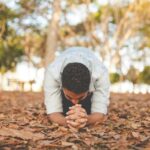 man kneeling