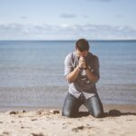 beach, idyllic, man, ocean, peaceful, person, praying, sand, sea, seashore, nature, seaside, shadow, sky, water, kneeling, begging, blue sky, blue beach, blue water, blue sea, blue ocean, blue pray, blue peace, blue sand
