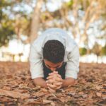 man kneeling