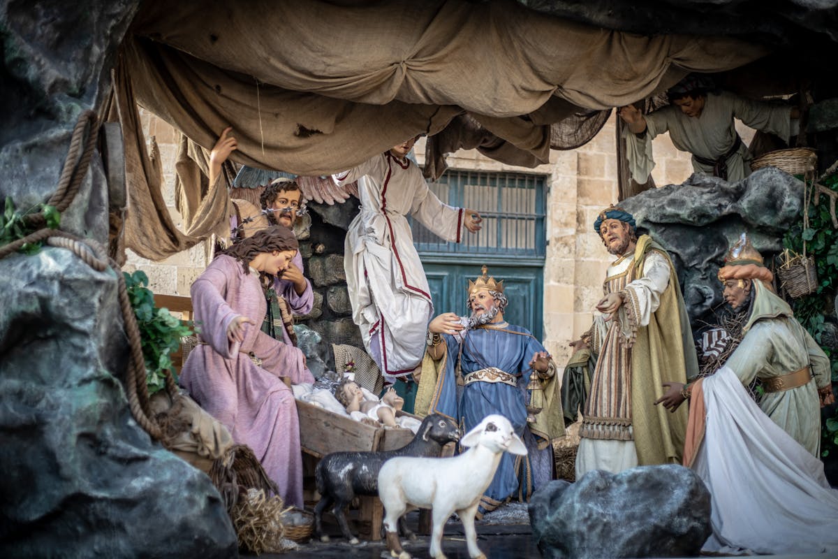 Intricate nativity scene showcasing the birth of Jesus, featuring lifelike figures and rich detailing.
