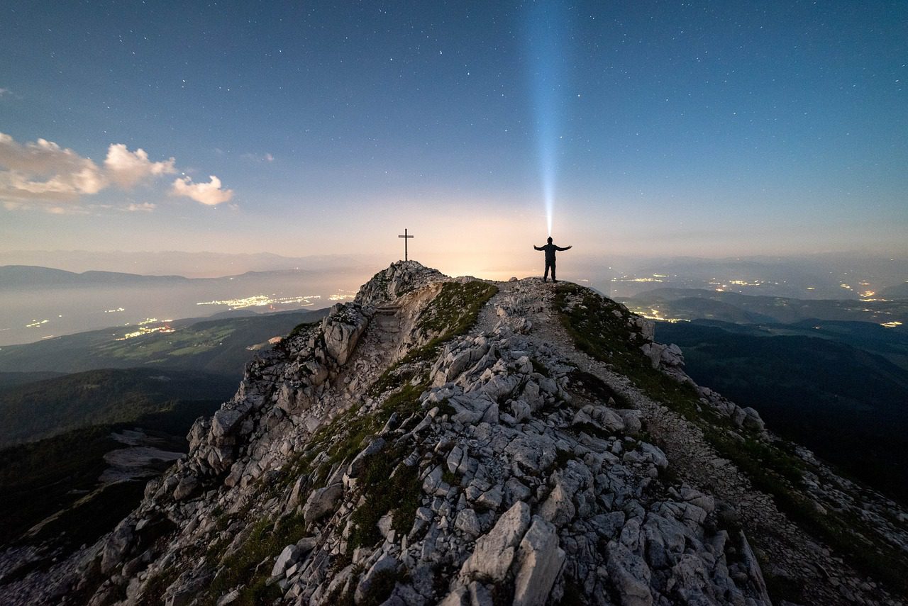 mountains, man, cross, stars, starry sky, universe, night sky, sky, galaxy, astronomy, space, science, shooting star, nature, evening, milky way, flashlight, headlamp, summit, long exposure