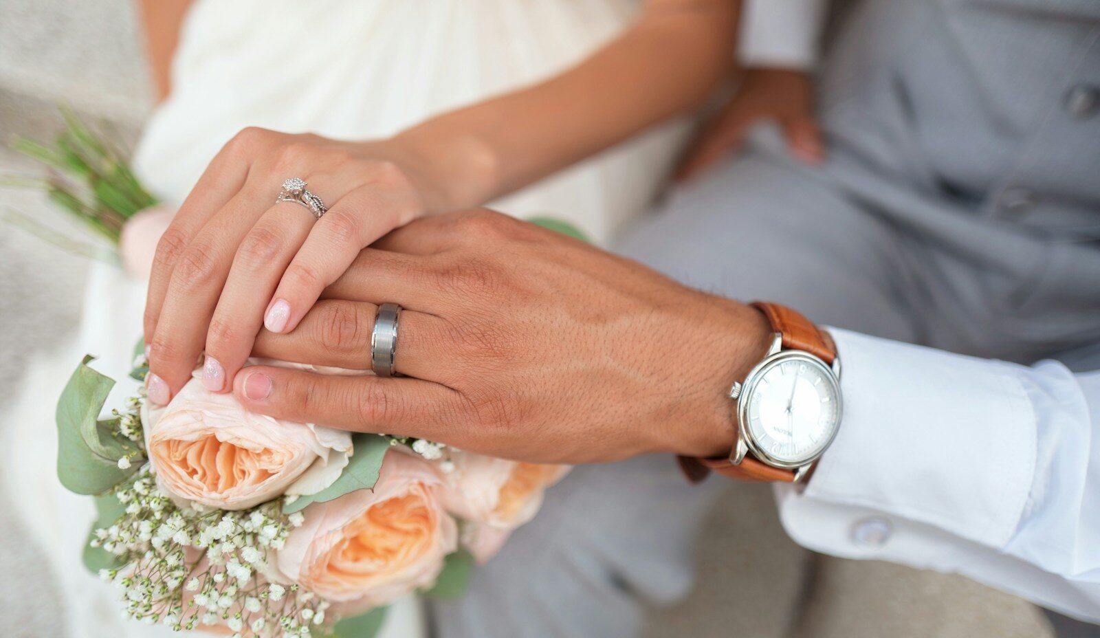 man and woman holding hands