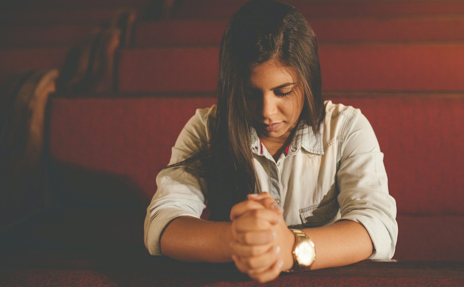 praying woman inside church