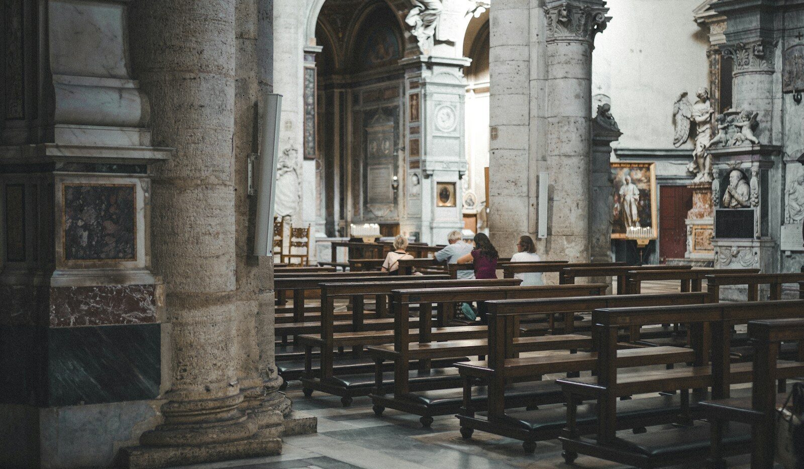 brown wooden chairs and tables inside building