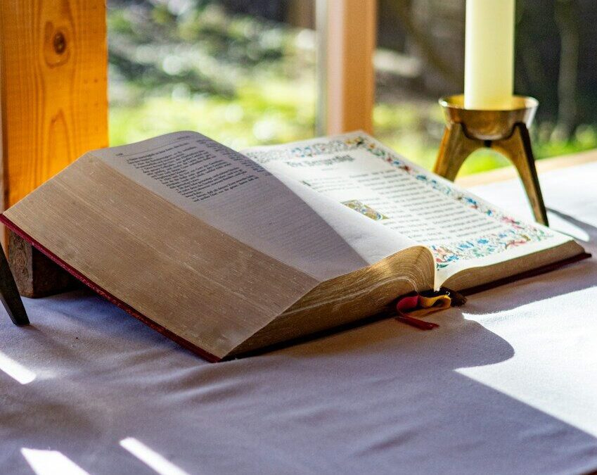 an open book sitting on top of a table