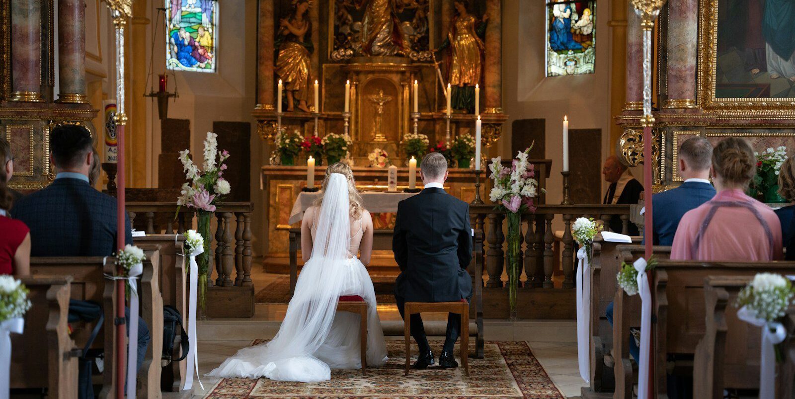 a bride and groom in a church