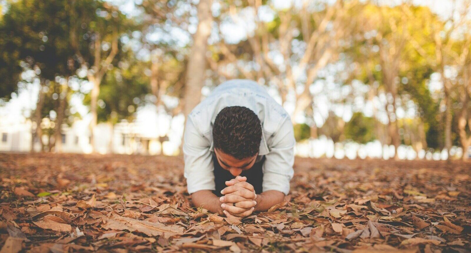man kneeling