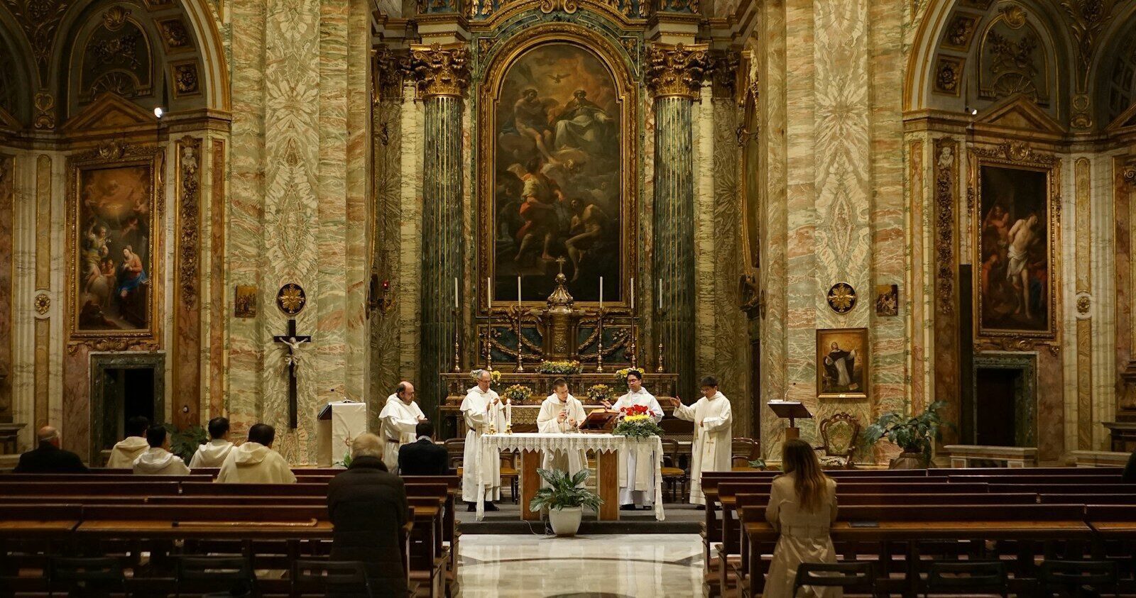 five priest inside cathedral