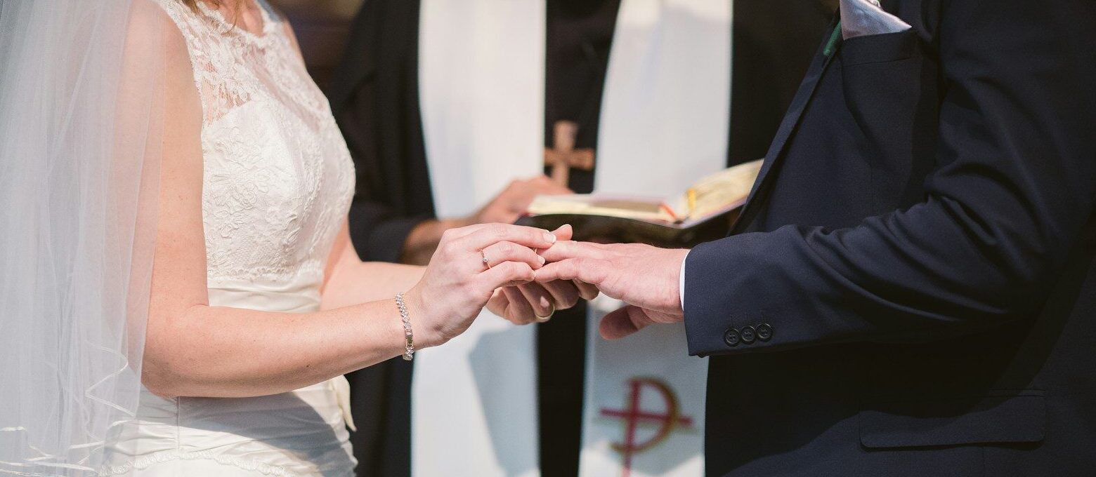 man and woman wedding reception