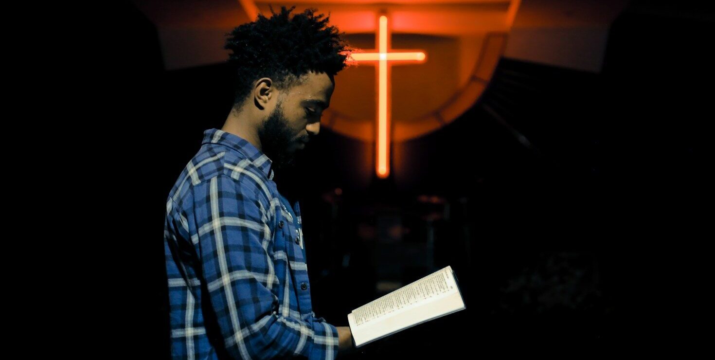 man reading book