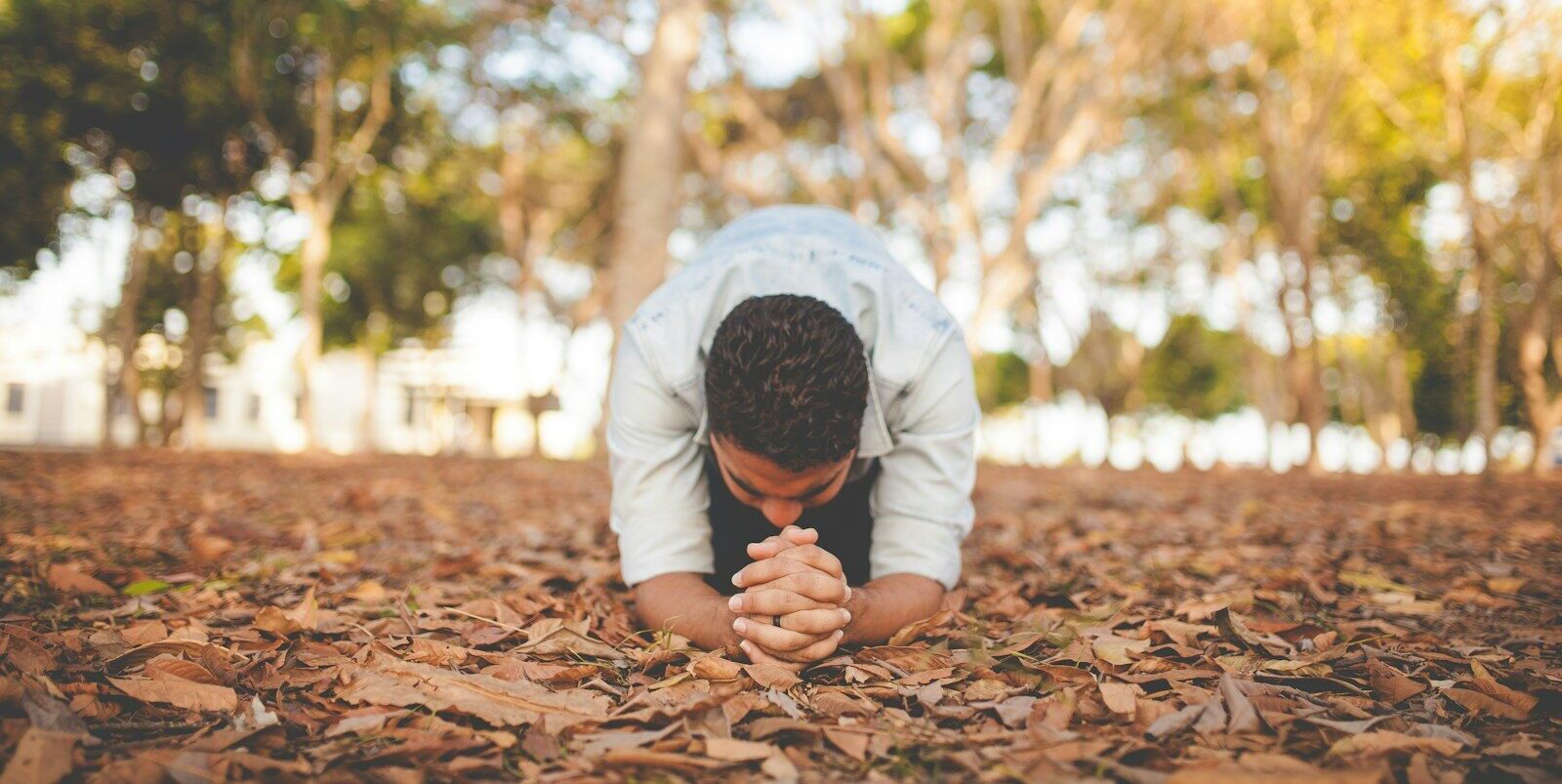 man kneeling