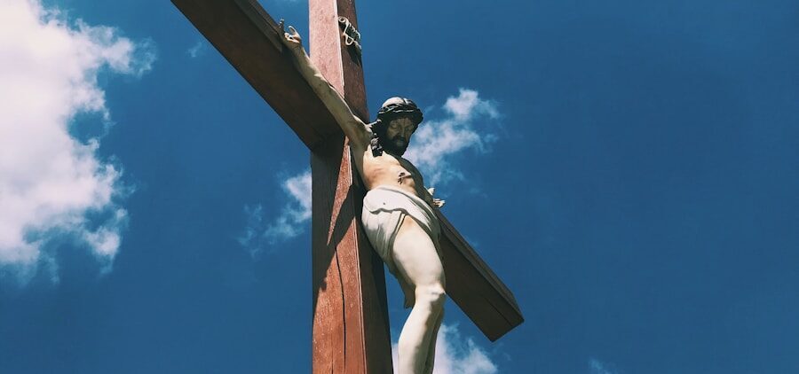 brown wooden cross under blue sky during daytime