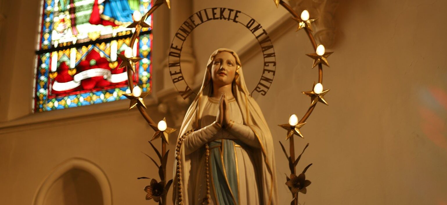 virgin mary statue inside building