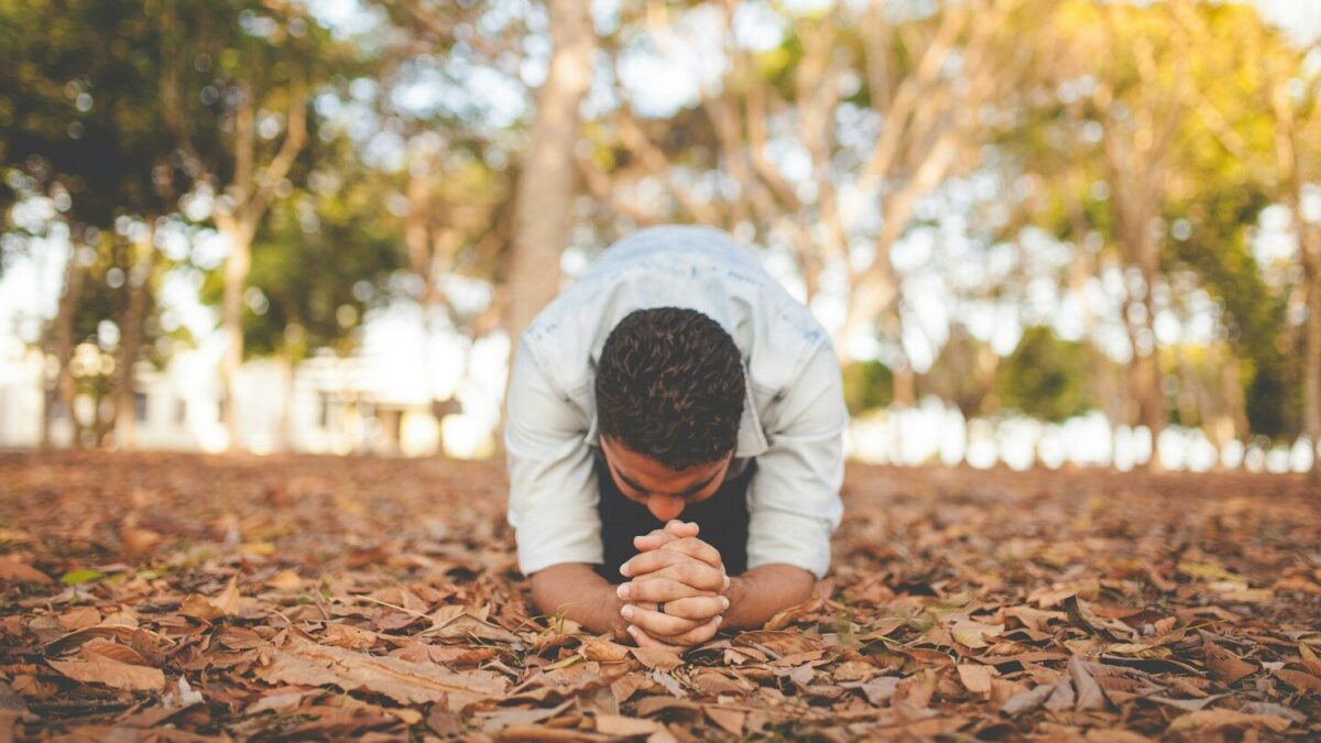 man kneeling