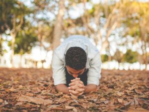 man kneeling