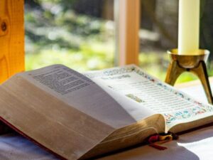 an open book sitting on top of a table